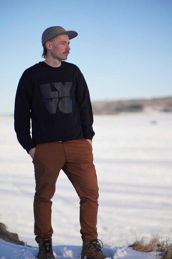 Lyvo Cycling Blocks Stealth Sweatshirt, front view showing black fabric with subtle branding and comfortable fit.