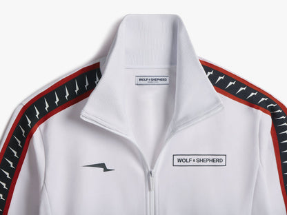 Americana // close-up of collar and chest with red and black striped trim