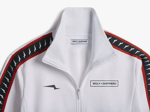 Americana // close-up of collar and chest with red and black striped trim
