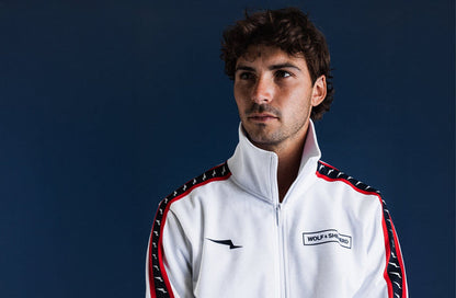 Americana // Man wearing white Crossover Track Jacket with striped trim