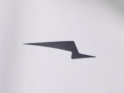 Americana // Close-up of Wolf & Shepherd wing logo on jacket fabric