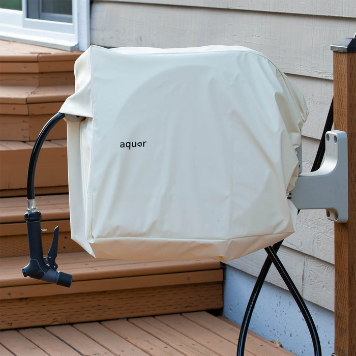 Aquor Retractable Hose Reel Cover in Cream on a stone Hose Reel installed with a House Hydrant V1+|47262152130810