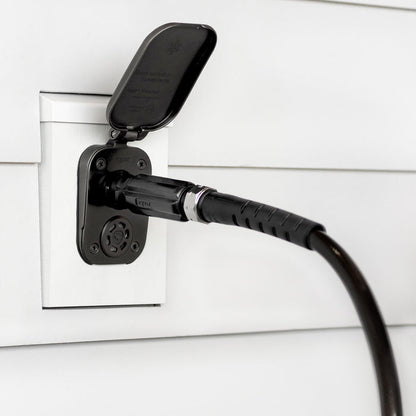 Jet black straight hose connector connected to matte black house hydrant v2+ installed on white lap siding with mounting block.|42443927650554